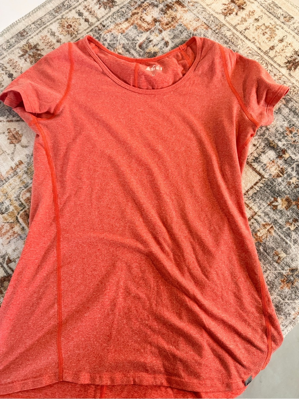 REI orange athletic tee
